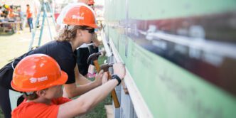 Students work on the 2017 Habitat house.