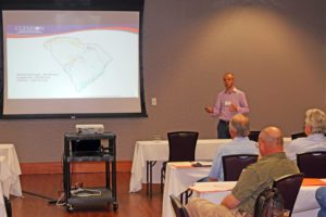 Lucas Clay addresses audience at the workshop.