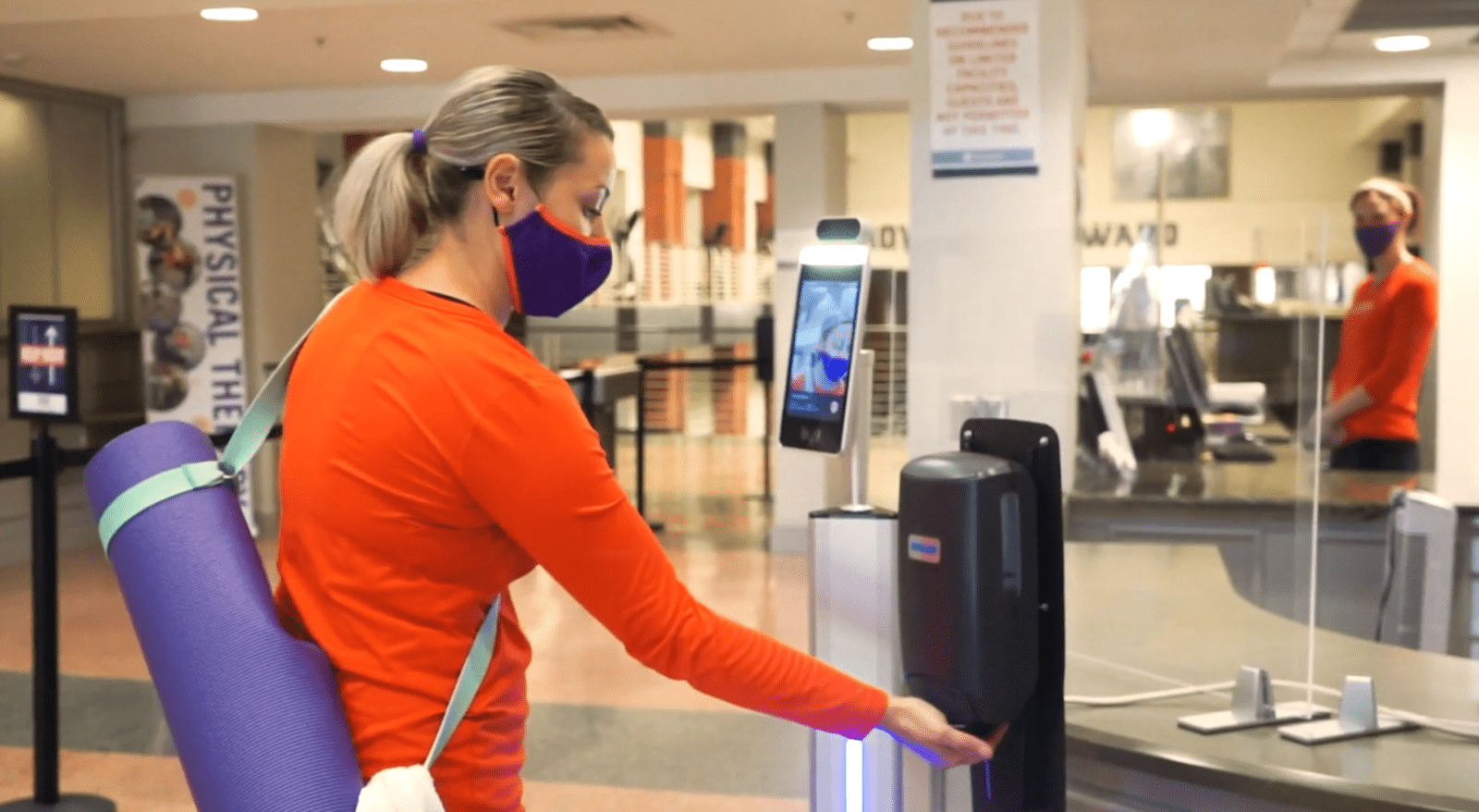 Haley Cox of Campus Recreation checks in to Swann Fitness Center at Fike