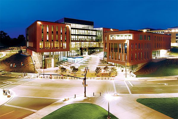 Exterior shot of Wilbur O. and Ann Powers College of Business at dusk