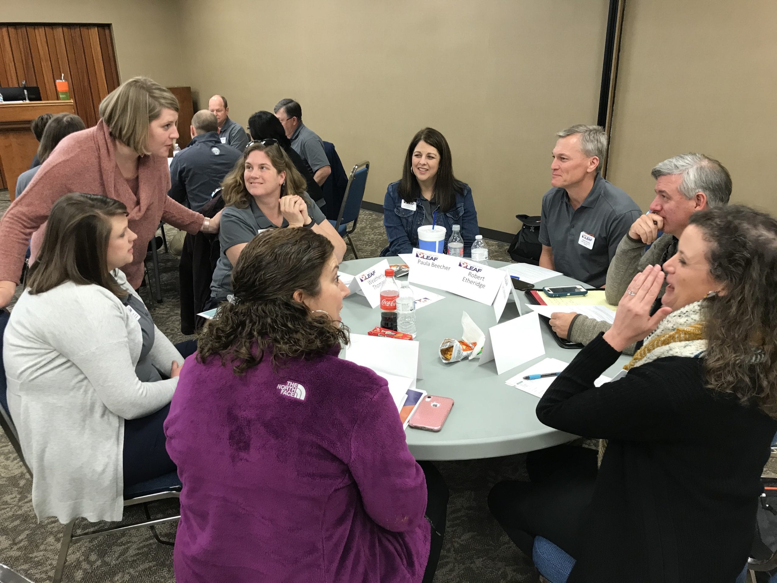 Palmetto LEAF participants at a round table enjoying themselves.