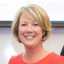woman wearing orange top