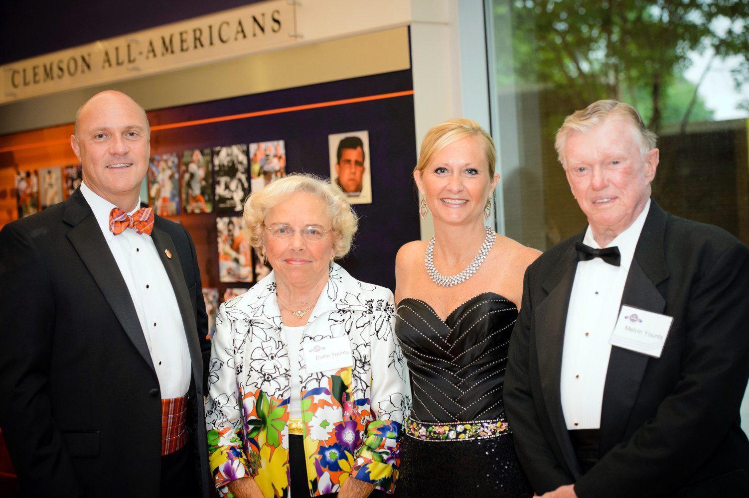 Image of Melvin and Dollie at formal event with President Clements and First Lady Beth Clements.