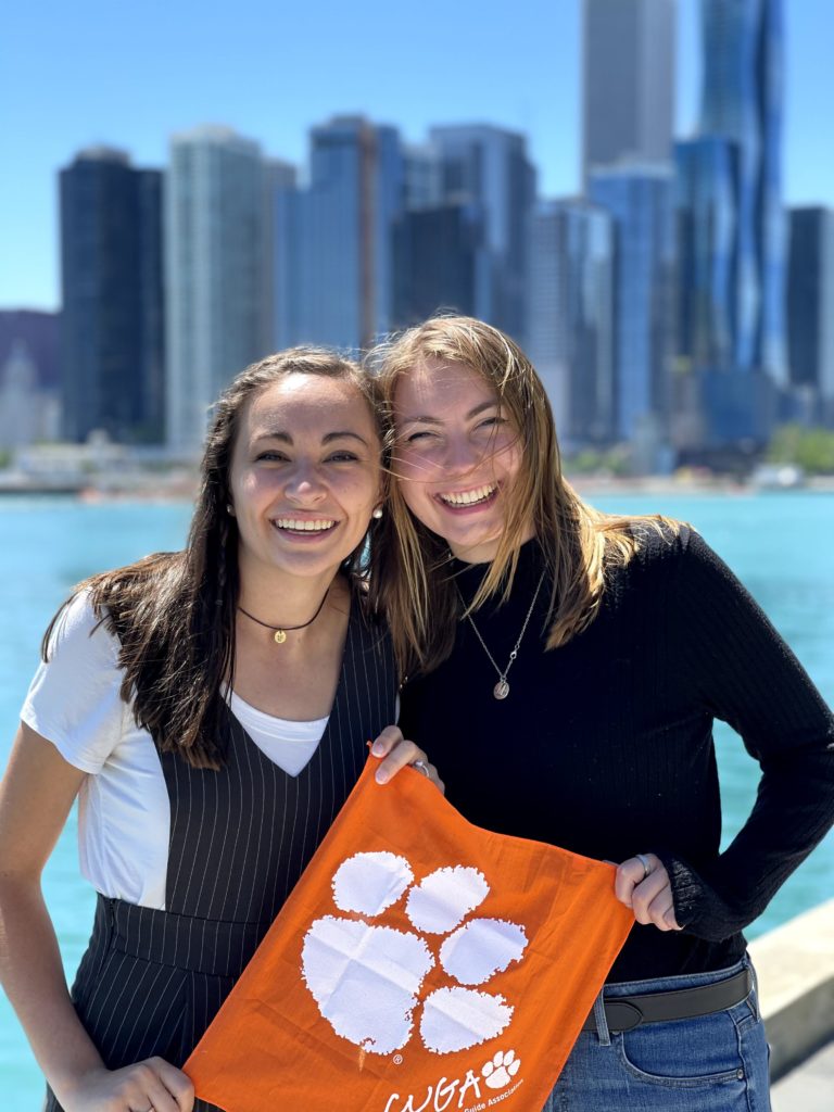 two Clemson students holding the Tiger rag