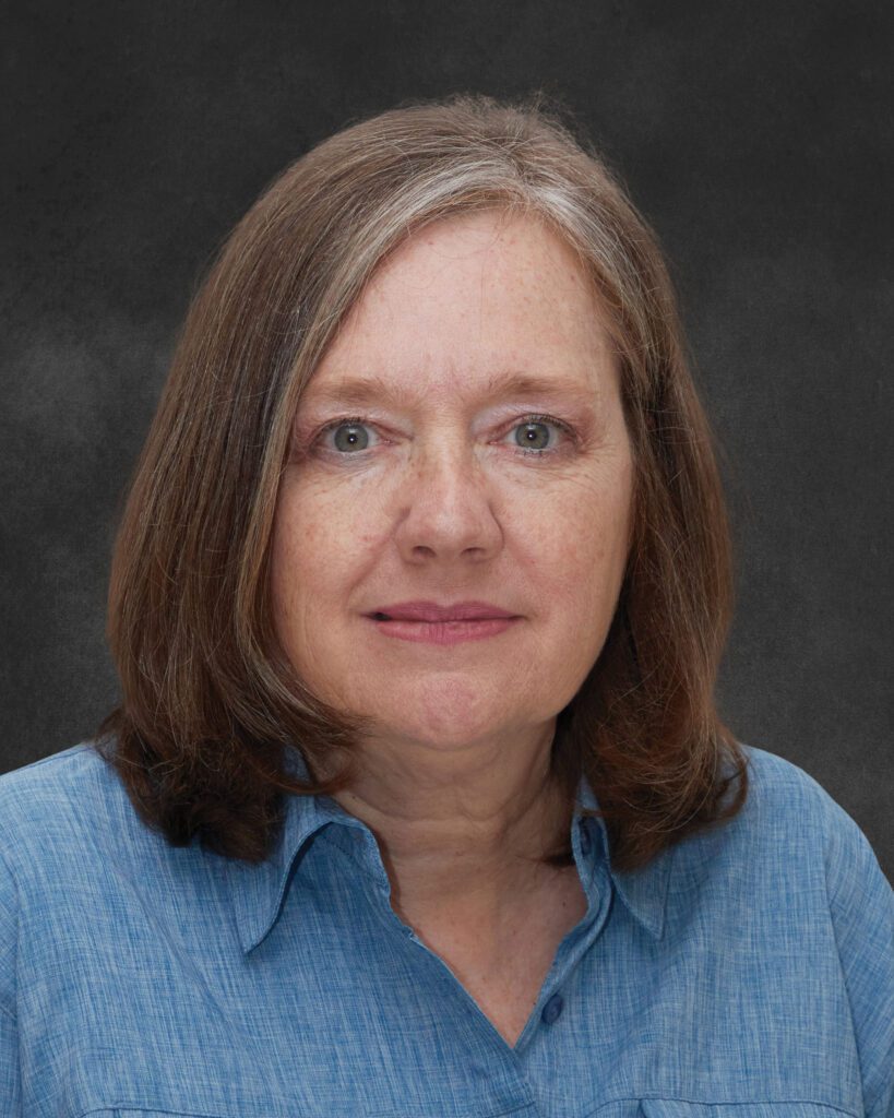 Studio headshot of Leslly Temesvari