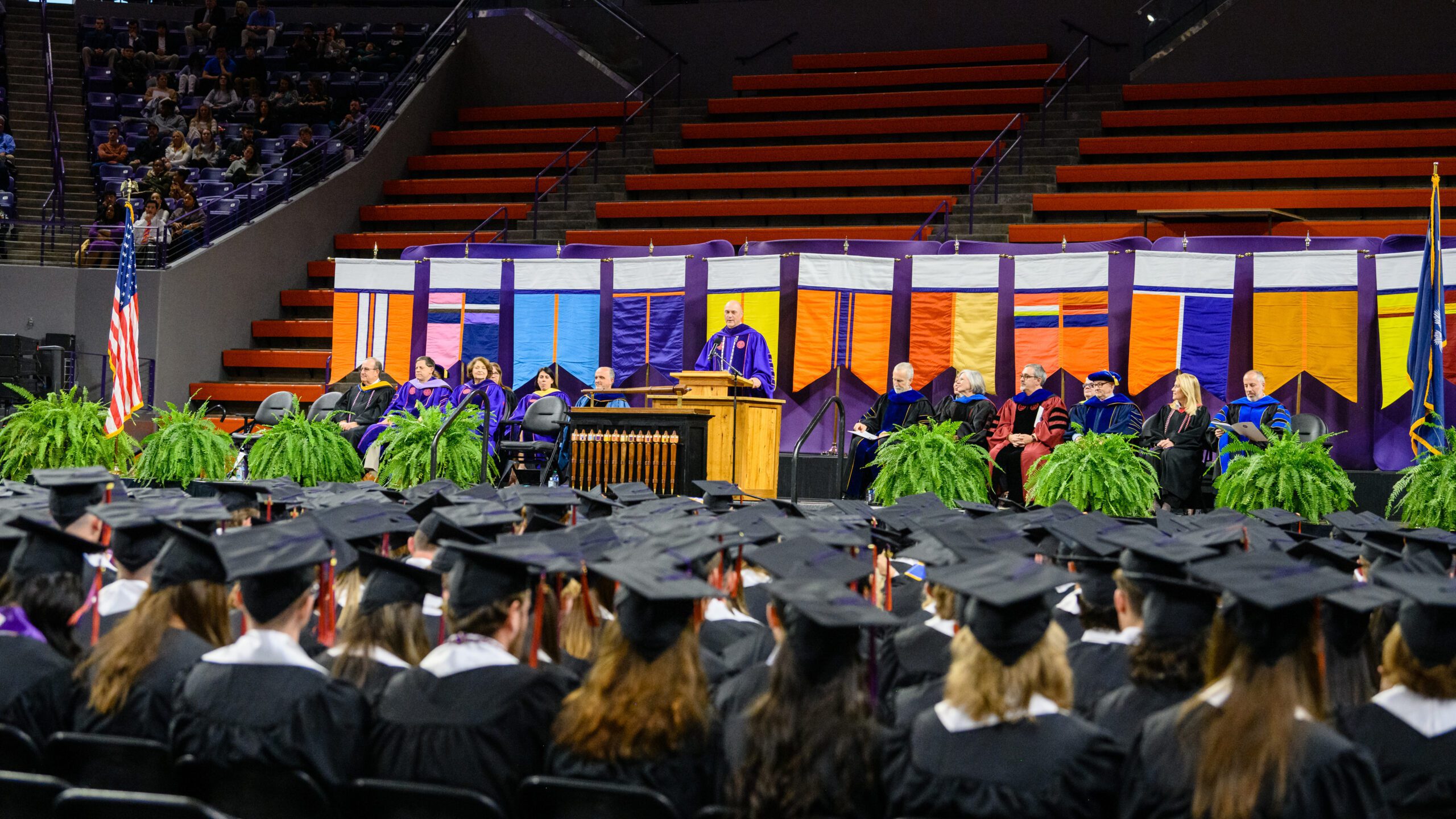 President Clements on stage at December 2022 commencement