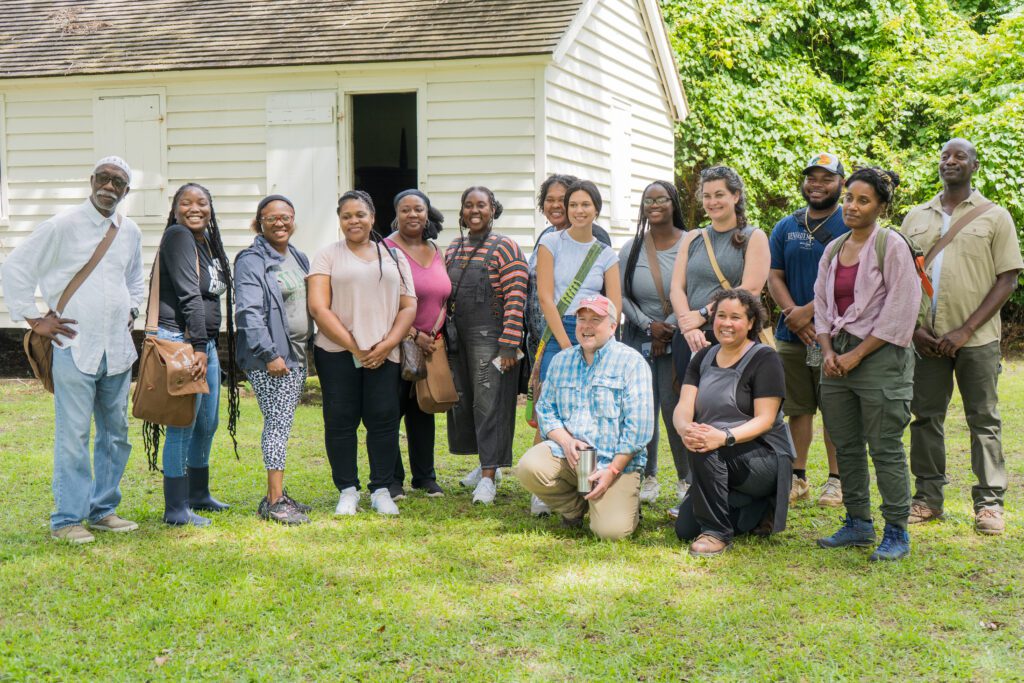Historic Preservation Johns Island Field School Students look into the camera as a group as they visit the McLeod Plantation Historical Site on Johns Island