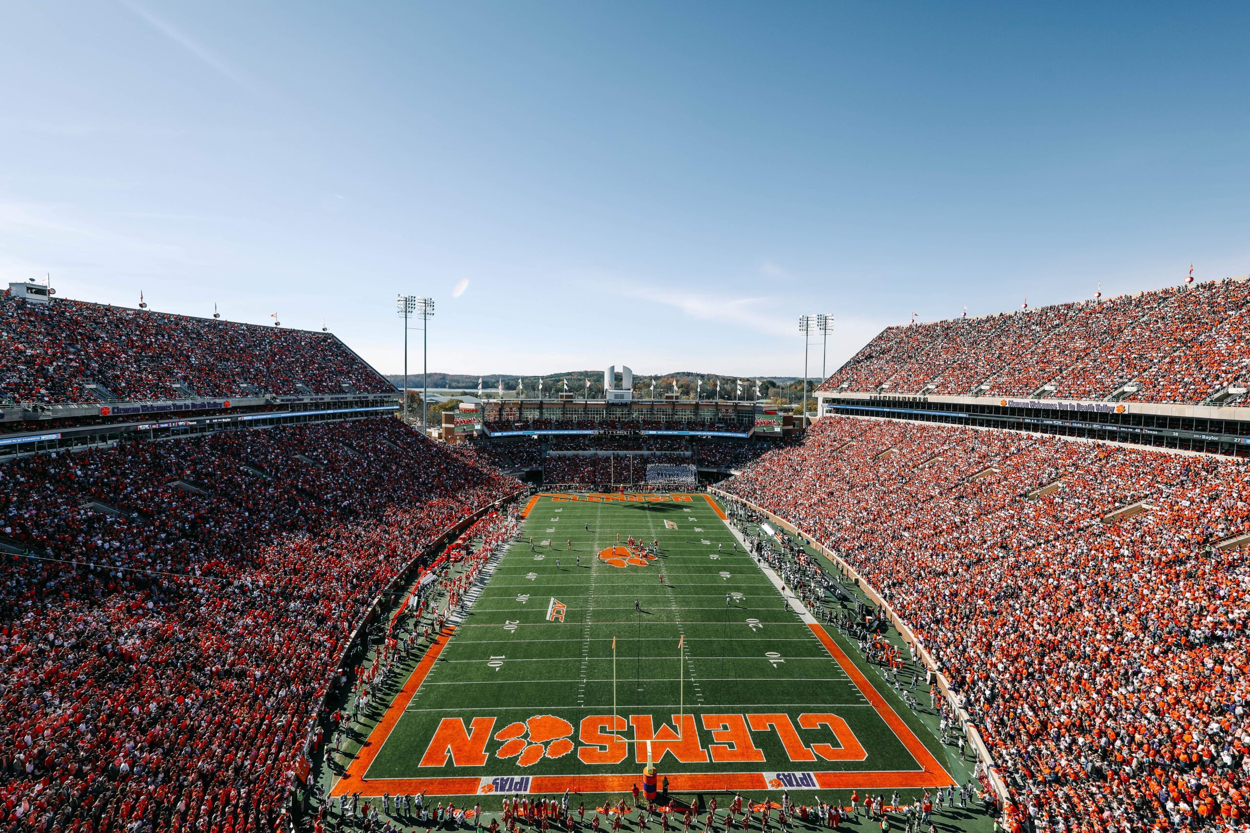 An aerial view of Clemson's football field with full stands during the daytime.