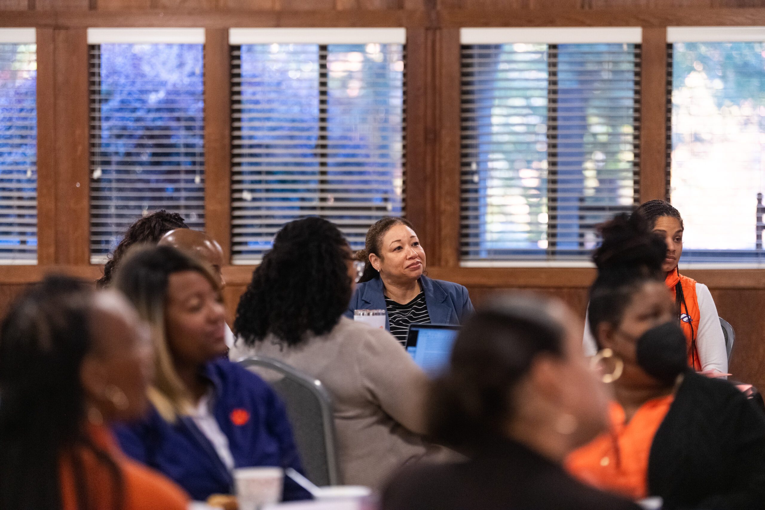 Members of the inaugural administrative leadership development cohort listen during a retreat in Fall 2022