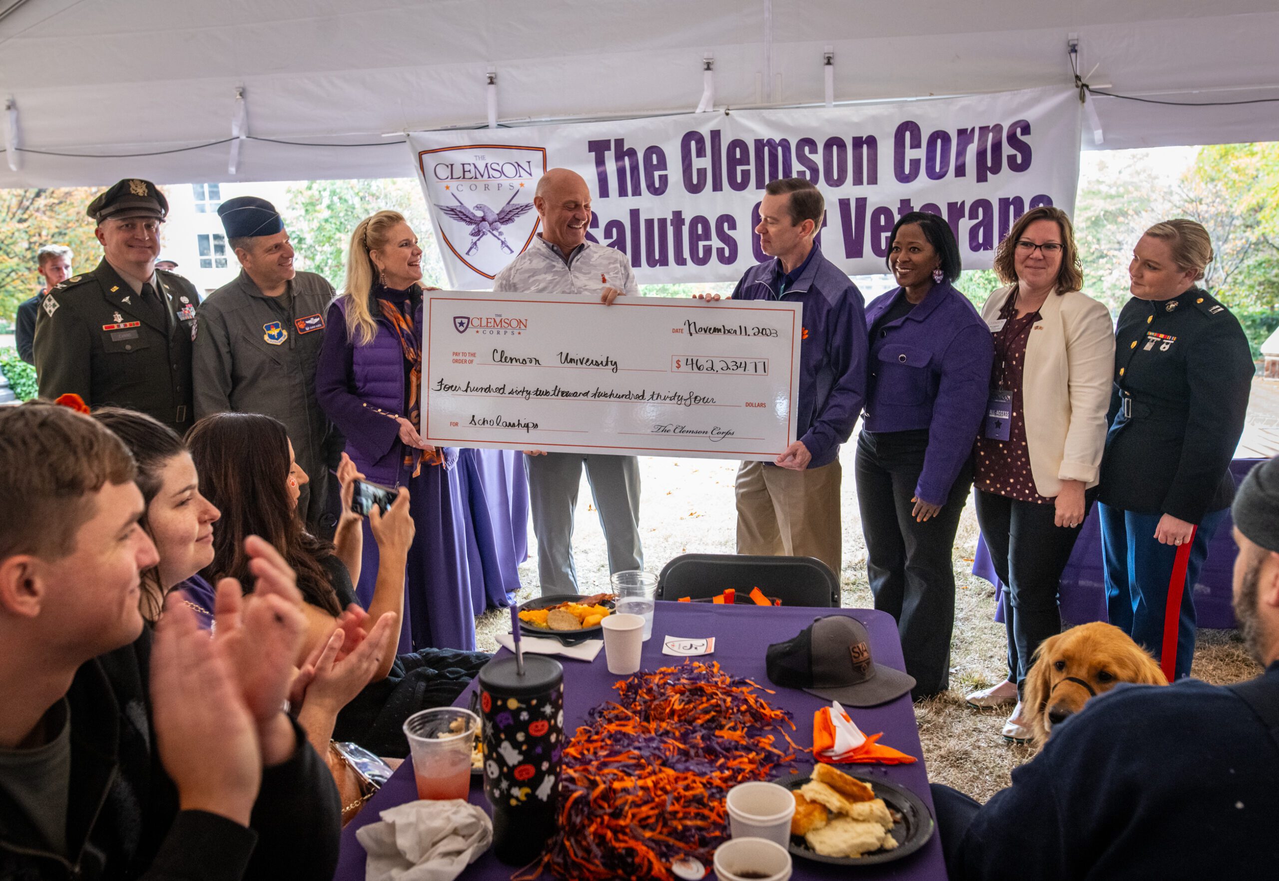 Clemson Corps is presented with a check during the 2023 Military Appreciation Day tailgate