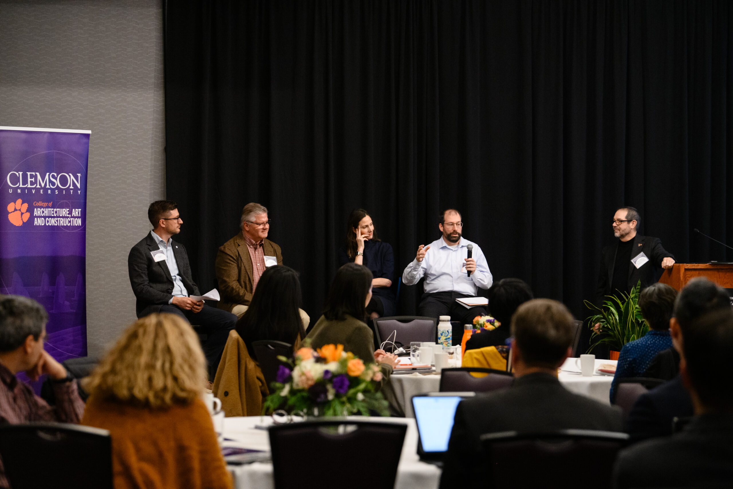 Panelists speak at the Human-Centered Building Design Symposium and Workshop, hosted by the College of Architecture, Art and Construction