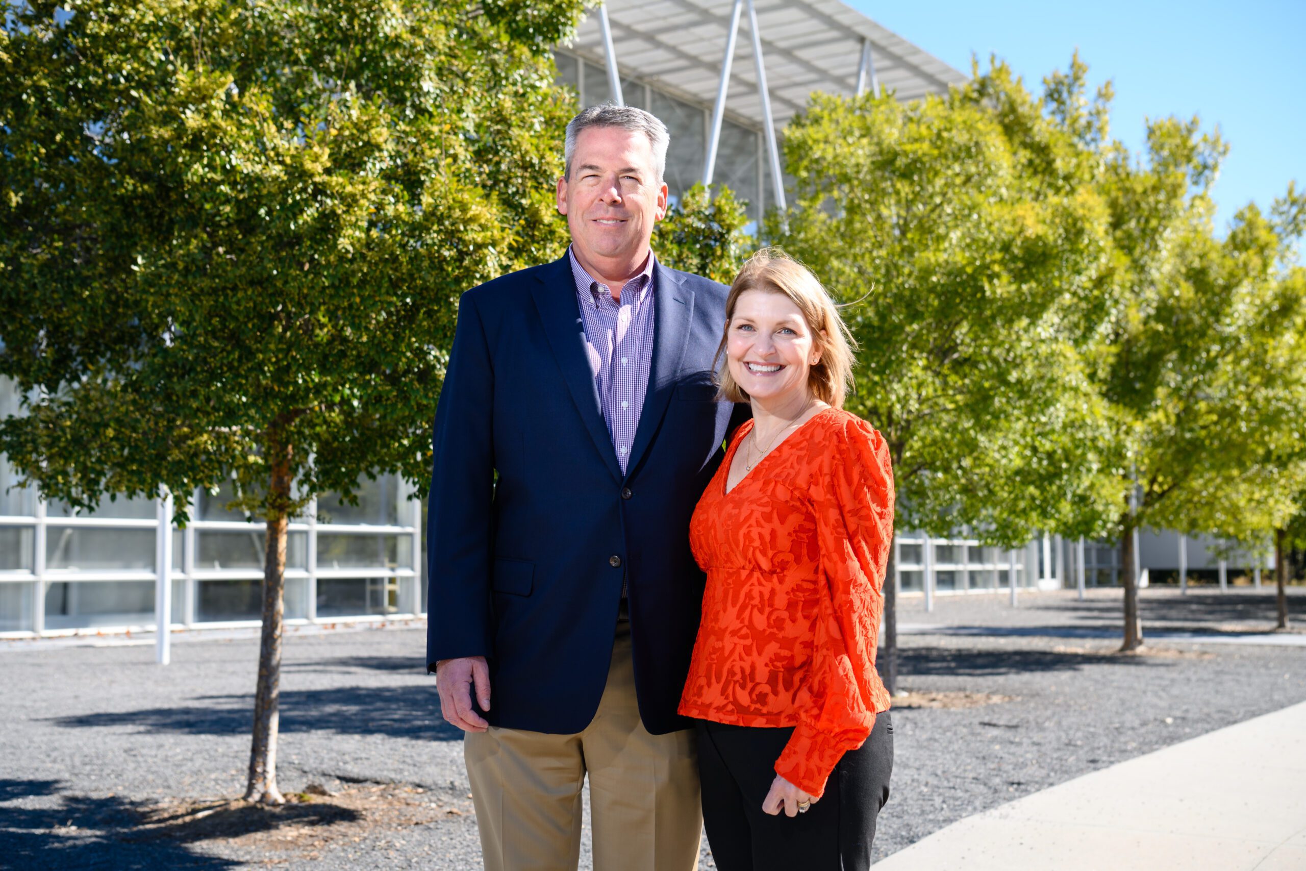 Skip ’89 and Mitzi ’91 Gardiner outside of Lee Hall on campus at Clemson University.