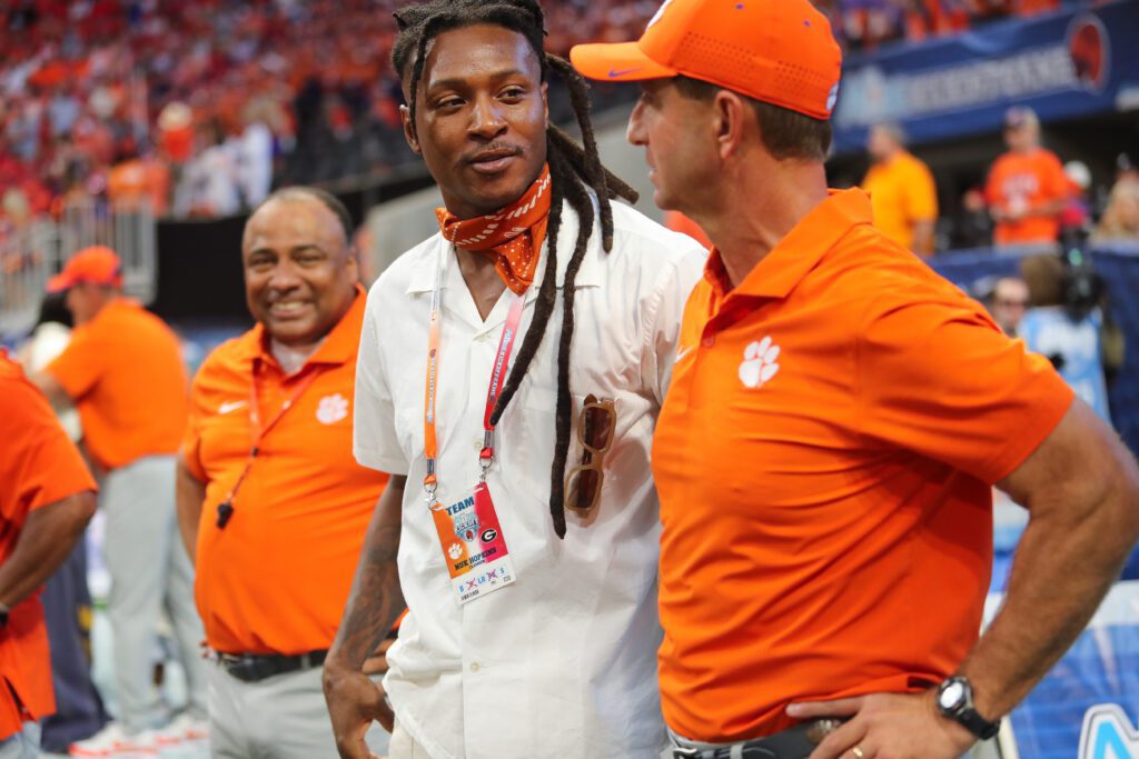 Larry Greenlee, DeAndre Hopkins and Dabo Swinney at a football game in Atlanta, Georgia in 2024