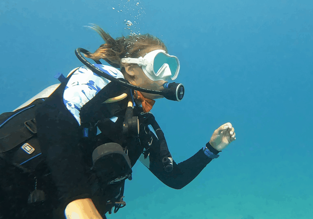 Female scuba diver in ocean