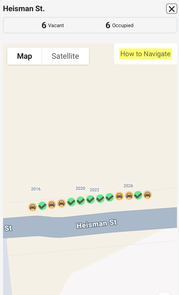 A traffic map showing a section of Heisman Street at Clemson University, with 12 circle icons of cars, some showing orange circles with car icons and some showing a black checkmark in a green circle.