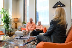 David and Sandra Sprouse sit with Dean Wendy York in her office at the Wilbur O. and Ann Powers College of Business.