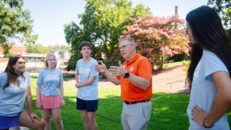 Doug Hallenbeck speaks to students on main campus in Clemson