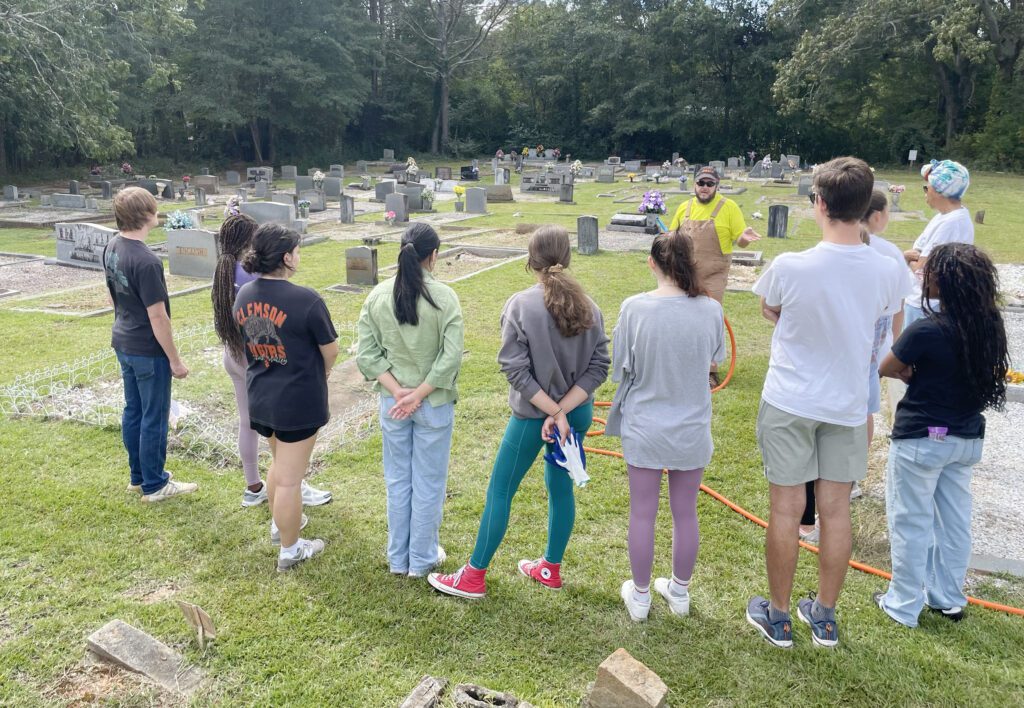 Volunteers receive instructions at Abel Baptist Church during Fall In Day of Service on Oct. 4, 2025