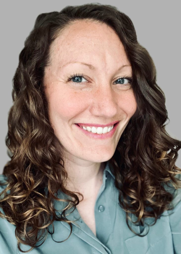 A woman wearing a light blue shirt